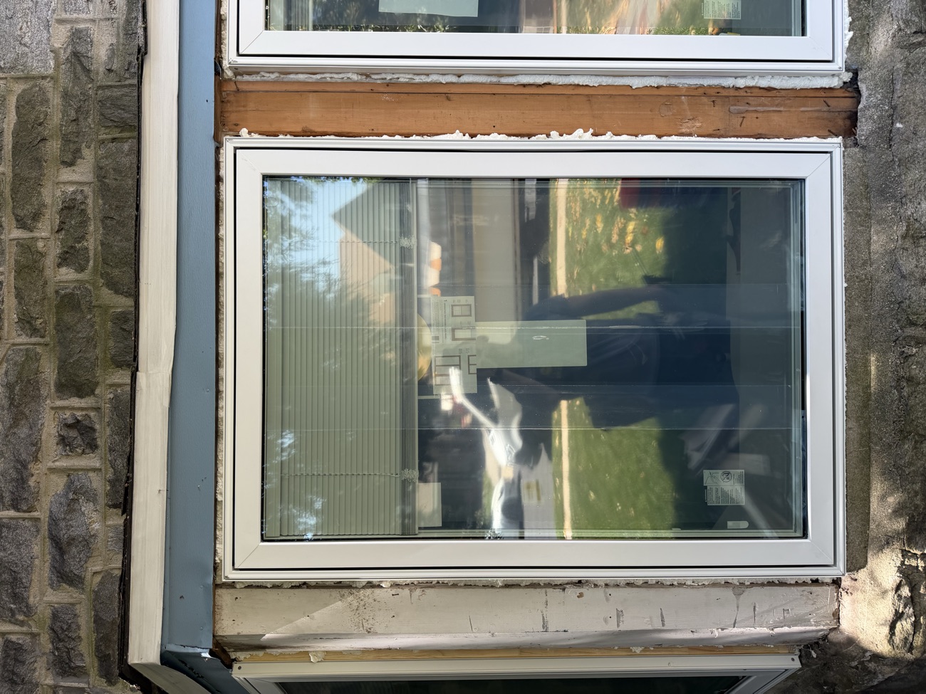 Stone-front bay rebuild — Full tear-out · casement set